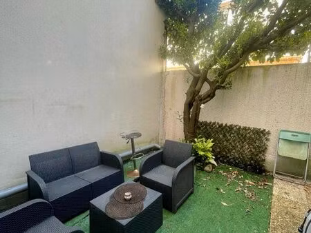 studio avec petit jardin  place de parking  juste à côté du tram