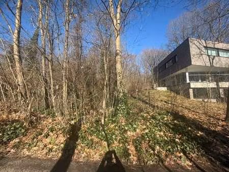 terrain à bâtir 1500m² en environnement boisé