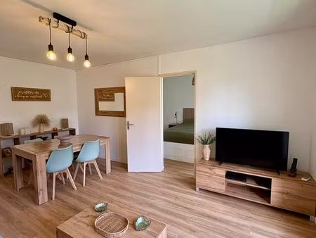 t3 de 68 m² en rdc avec balcon - proximité centre-ville