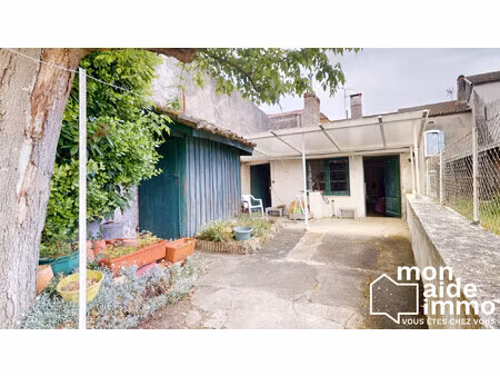 grande maison de ville à fort potentiel avec jardinet