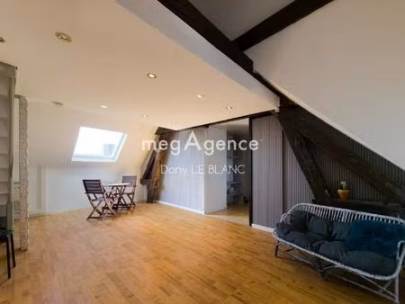 studio lumineux avec mezzanine et parking