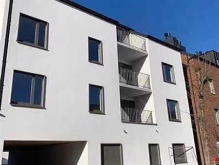 immeuble récent - 2ch + parking + cave