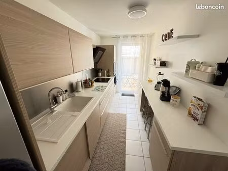 appartement 65m2  2 chambres  terrasse  balcon et box en sous sol