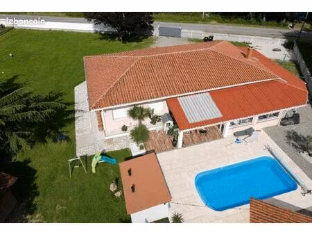 maison familliale 120m² avec piscine et jardin sur terrain de 2100m²