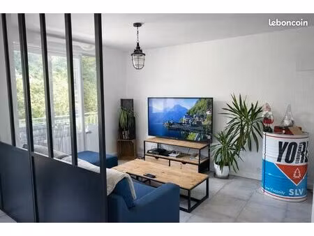 appartement t4 – 100 m² avec jardin  2 places de stationnement et cave