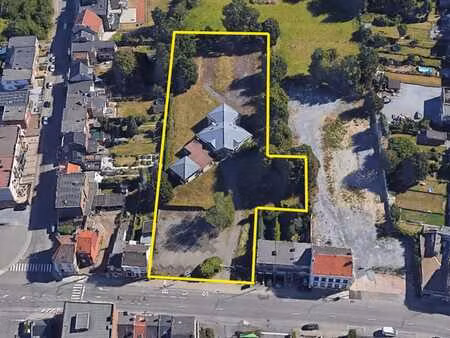 terrain de +- 6.000 m²