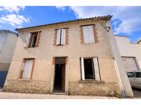 centre de caussade maison avec jardin et garage à rénover