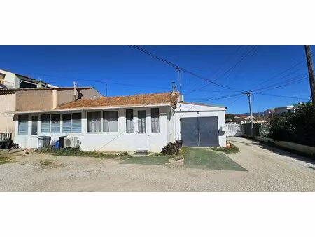 maison de 80m² divisée en 2 appartements avec garage et cave