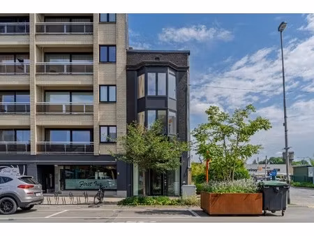 gerenoveerde handelswoning met tuin op topligging