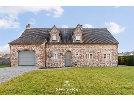 ruime open bebouwing met 4 slaapkamers en zonnige tuin in houthalen