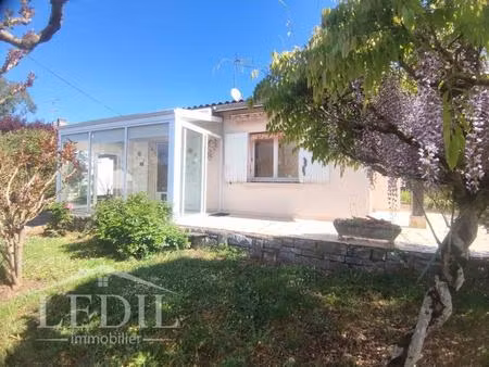maison plain pied avec jardin et véranda