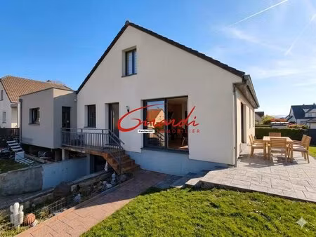 maison de 128m2 sur 4.67 ares  4 chambres  sous sol avec garage  dpe b avec terrasse.