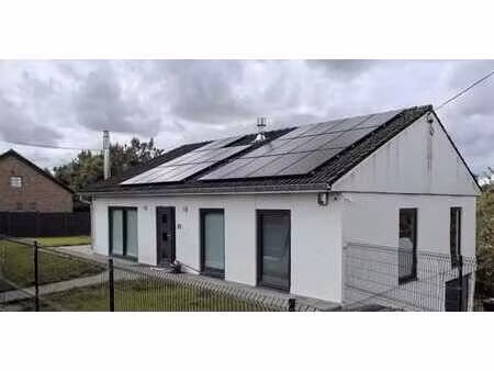 magnifique maison 4 façades avec jardin  garage et parking