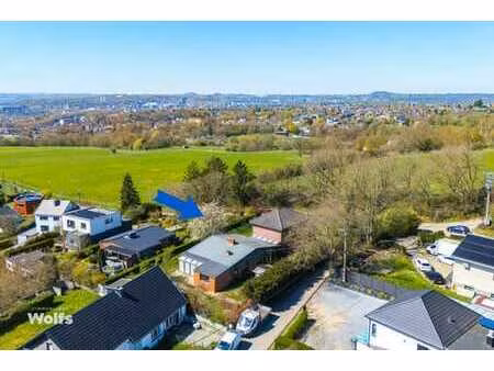 ensemble de deux maisons dans un endroit verdoyant !