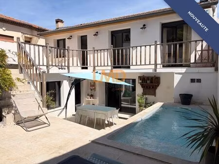 maison de ville garage bain romain solarium et cour