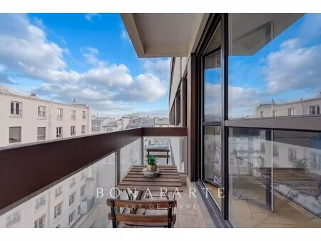 paris / 2e arrondissement - appartement lumineux - étage élevé avec balcon et parking