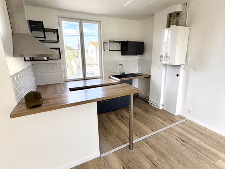 appartement t3 lumineux avec balcon et jardin