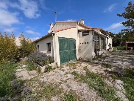 maison sur une grande parcelle constructible