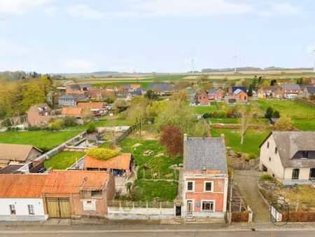 maison 3 façades sur 790m² à rénover totalement.