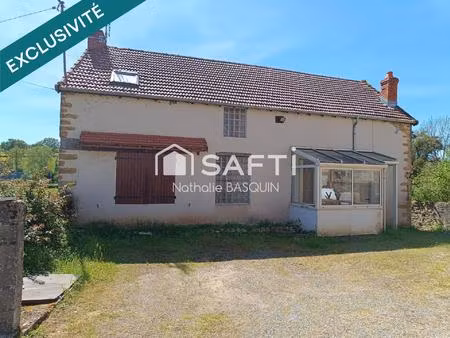 genouilly grande maison en pierre avec jardin