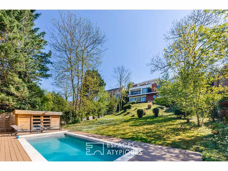 a presles : maison d'architecte baignée de lumière  avec piscine et vue sur la vallée