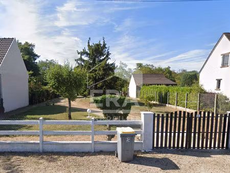 terrain à contruire situé à checy  surface 450m²