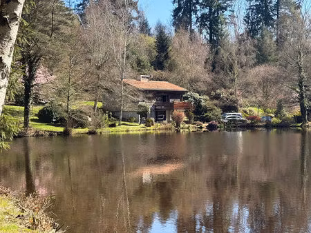propriété de 11 hectares avec maison  dépendance  et 2 étangs  entourée de bois.