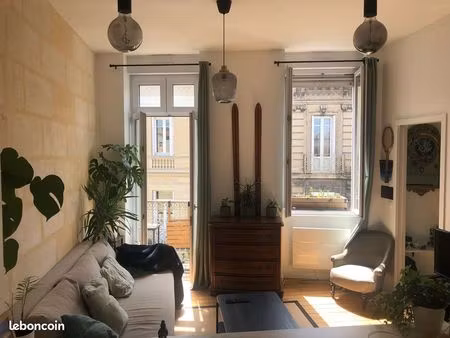 t2 meublé 31 m² – charme pierre & parquet – 2 balcons – saint-seurin / croix blanche – lig