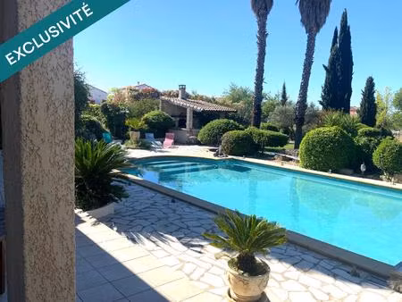 propriété rare: composée de deux maisons au cœur d'un splendide jardin paysagé