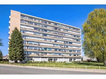 ruim 3-slaapkamerappartement met potentieel + garage