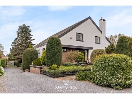 authentieke villa met praktijkruimte en grote tuin te hoepertingen