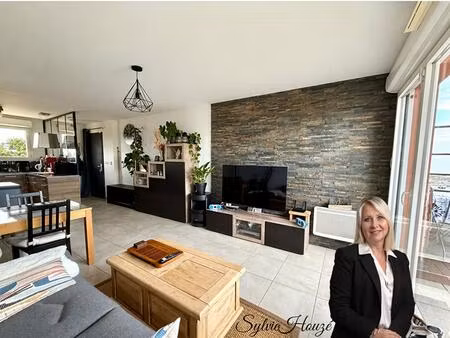 appartement de type 3 avec grande terrasse et 2 places de parking