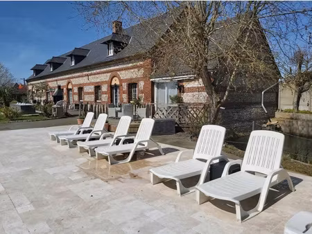 maison rénovée briques et silex t10 de 390 m2 avec piscine 