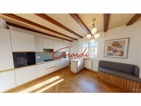 appartement f5 de 98 m2   balcon  cave et garage double