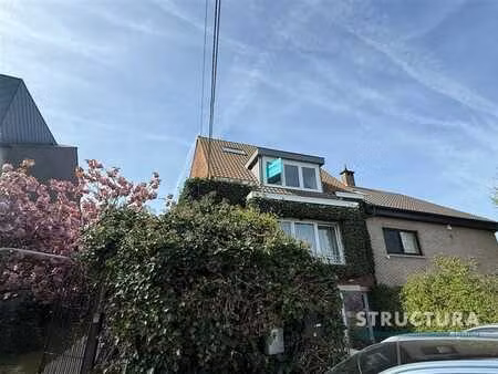 appartement en duplex avec place de stationnement