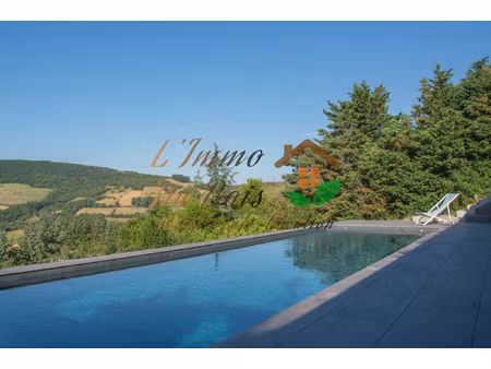 maison avec terrain clos et piscine