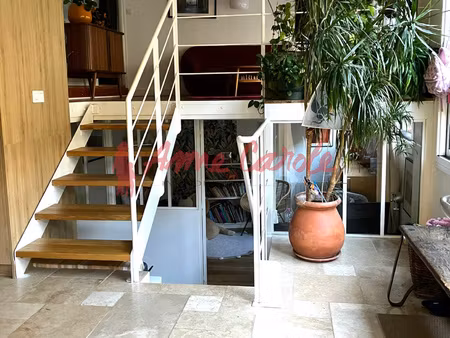 ancien atelier transformé en appartement familial lumineux