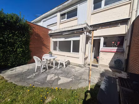 maison de ville avec garage  jardin et beau potentiel