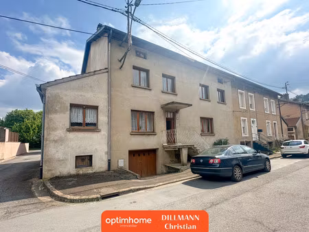 maison jumelée avec garage et jardinet