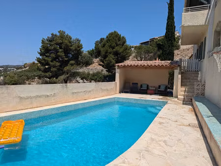 maison vue mer à louer 158 m²- t4 - terrasse - piscine - cuisine d'été - 2 garages et t2 i