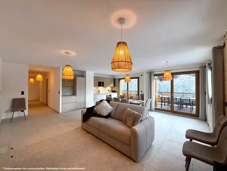 à vendre – superbe appartement t4 de 106.72 m² avec balcon au coeur du village de châtel (