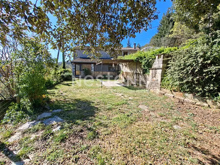 maison terrain et vue