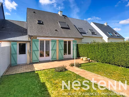 maison avec garage et jardin à deux pas du centre-ville