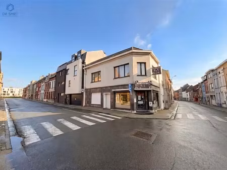 opbrengsteigendom met handelspand en appartement