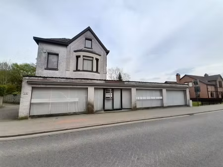 handelspand met woonhuis en tuintje