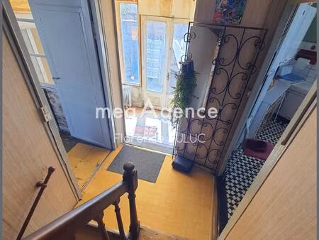 maison avec patio et petit garage en centre ville
