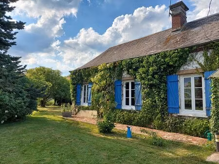 maison de 70 m2 et dépendance sur parc de 4 200m2 -