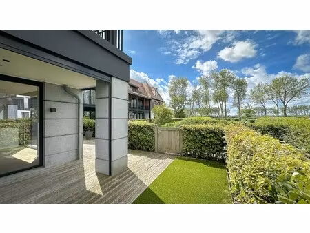 gelijkvloers hoekappartement  zonnig terras  te duinenwater