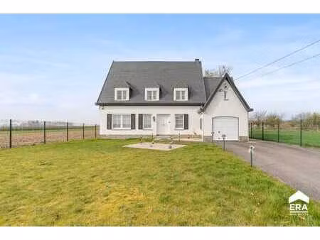 à vendre: maison ouverte avec grand jardin