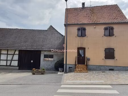 ensemble immobilier disposant d' une maison  d'une grange et d'une dépendance sur un...